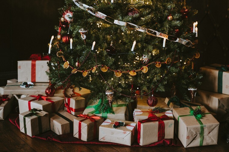 Need some help getting presents under the tree? We got you. (Image Source: Annie Spratt on Unsplash.com)